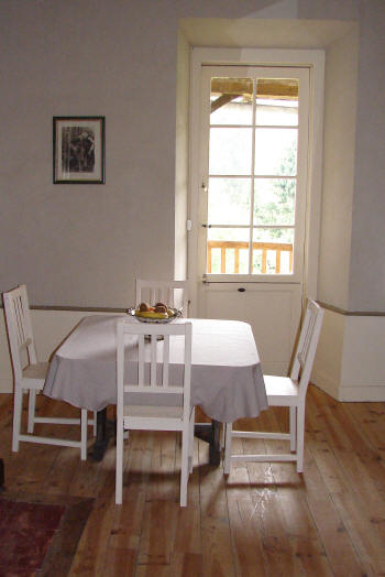 Living room with the Balcony overlooking the garden.