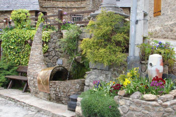 This tiny village park celebrates the local SABOT maker. Sabot are the traditional wooden shoe of the Couserans region. The long pointed toe is unique to the Couserans... AND to certain traditional GREEK communities!